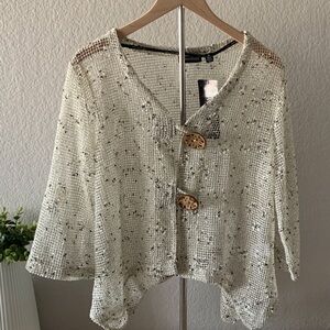 Nina Leonard Cream and Black Cape